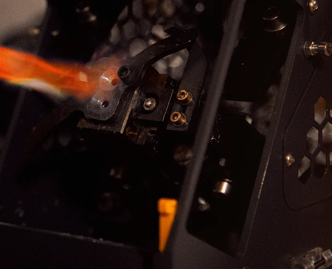 Close-up of precision bullet manufacturing machinery with a controlled heated process forming components at CastBullets.co.uk.