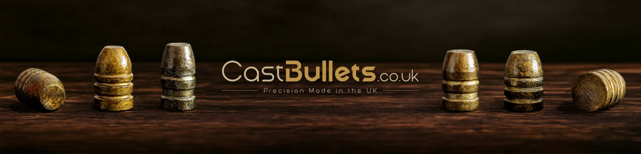 CastBullets.co.uk shop banner featuring polymer-coated cast bullets on a wooden surface with the tagline ‘Precision Made in the UK’.